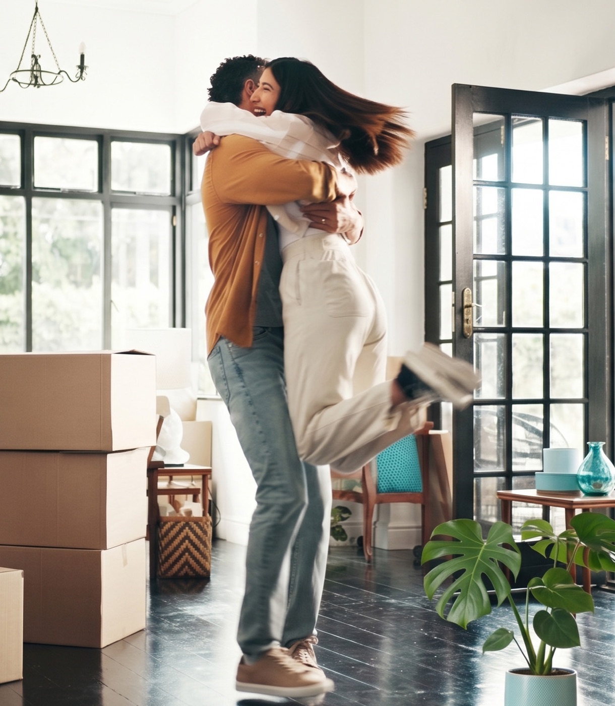 A couple celebrating in their new home